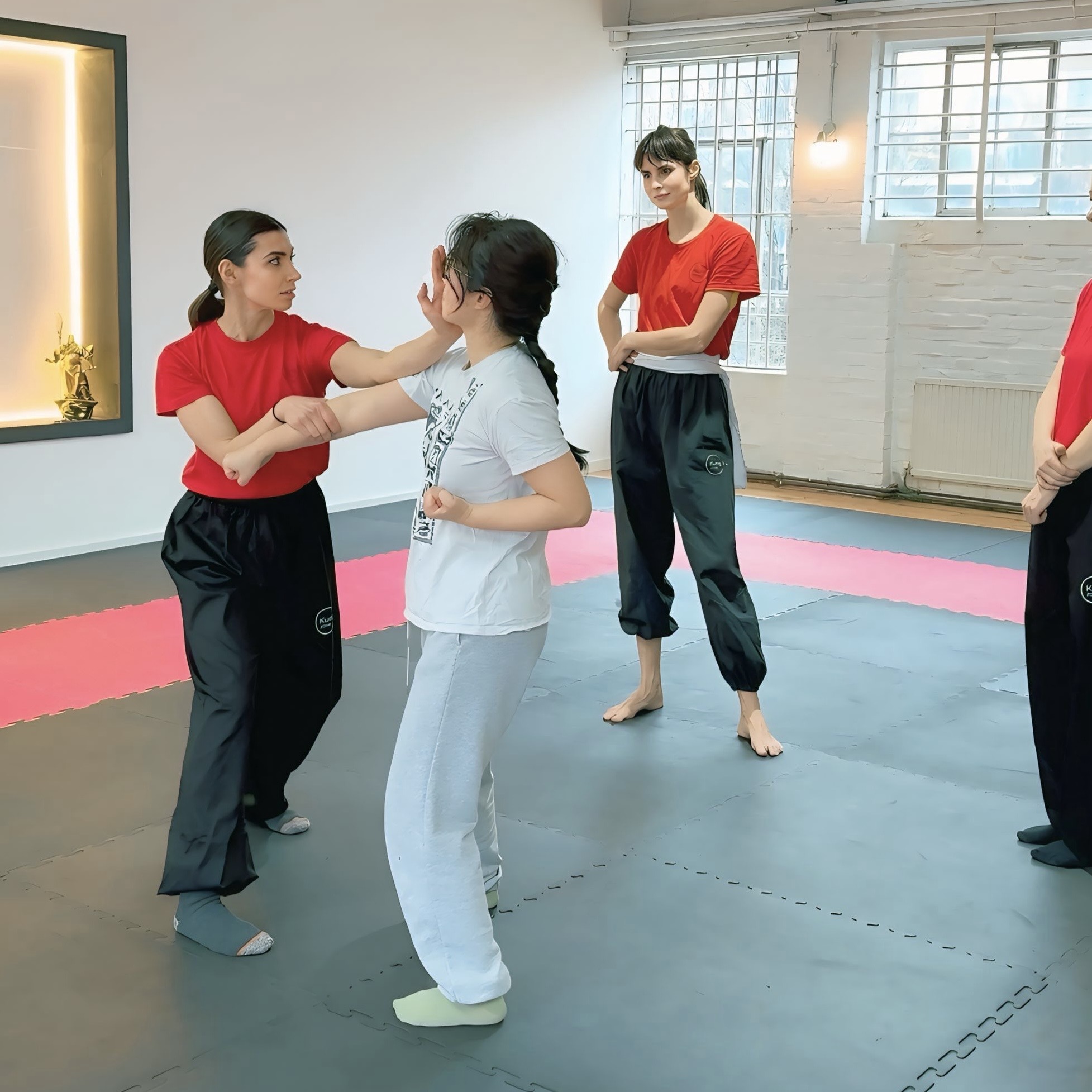 students sitting in kung fu class